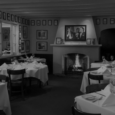 Luxury leather booths and classic bar inside Montecito dining room