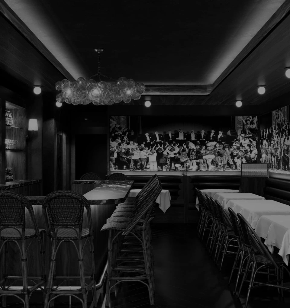 Interior of Lucky's Steakhouse SOHO location in New York, presenting an upscale, moody, and energetic dining atmosphere